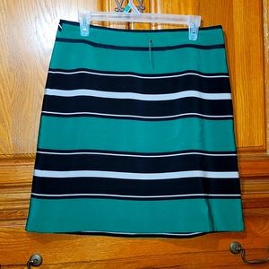 Black, green, and grey stripe skirt.